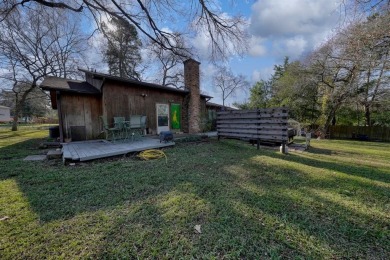 Step inside this charming single-story cottage and discover the on Hide-A-Way Lake Golf Course in Texas - for sale on GolfHomes.com, golf home, golf lot