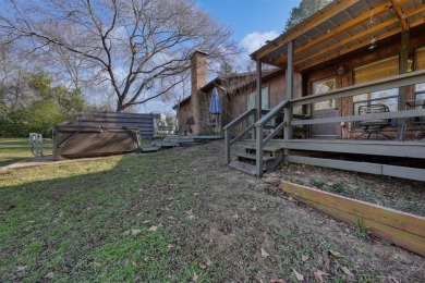 Step inside this charming single-story cottage and discover the on Hide-A-Way Lake Golf Course in Texas - for sale on GolfHomes.com, golf home, golf lot