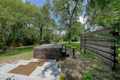 Step inside this charming single-story cottage and discover the on Hide-A-Way Lake Golf Course in Texas - for sale on GolfHomes.com, golf home, golf lot