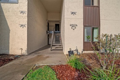 Lake Sparkle 55+ FURNISHED LAKEFRONT 1st FLOOR Condominium on Country Club At Silver Springs Shores in Florida - for sale on GolfHomes.com, golf home, golf lot