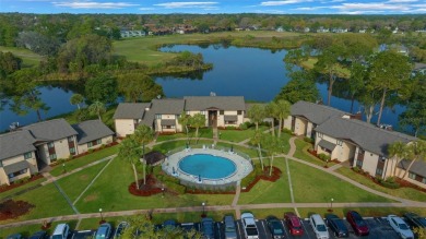 Lake Sparkle 55+ FURNISHED LAKEFRONT 1st FLOOR Condominium on Country Club At Silver Springs Shores in Florida - for sale on GolfHomes.com, golf home, golf lot