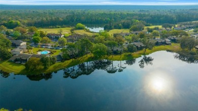 Lake Sparkle 55+ FURNISHED LAKEFRONT 1st FLOOR Condominium on Country Club At Silver Springs Shores in Florida - for sale on GolfHomes.com, golf home, golf lot