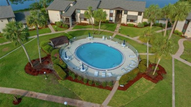 Lake Sparkle 55+ FURNISHED LAKEFRONT 1st FLOOR Condominium on Country Club At Silver Springs Shores in Florida - for sale on GolfHomes.com, golf home, golf lot