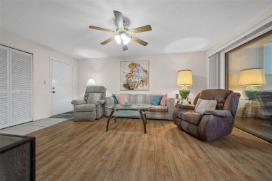 Lake Sparkle 55+ FURNISHED LAKEFRONT 1st FLOOR Condominium on Country Club At Silver Springs Shores in Florida - for sale on GolfHomes.com, golf home, golf lot