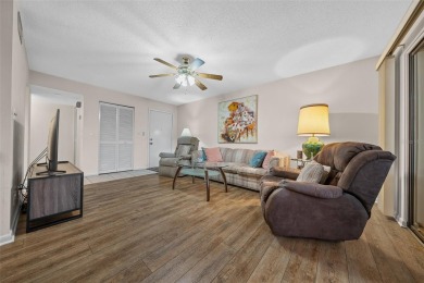 Lake Sparkle 55+ FURNISHED LAKEFRONT 1st FLOOR Condominium on Country Club At Silver Springs Shores in Florida - for sale on GolfHomes.com, golf home, golf lot