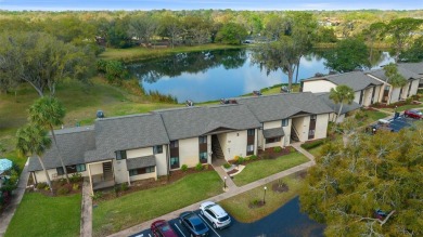 Lake Sparkle 55+ Partially FURNISHED LAKEFRONT Condominium on Country Club At Silver Springs Shores in Florida - for sale on GolfHomes.com, golf home, golf lot