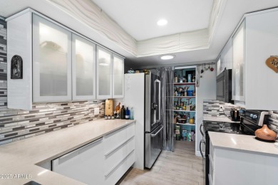 Stunning, fully updated condo PLUS BONUS ROOM, and modern on Leisure World Country Club in Arizona - for sale on GolfHomes.com, golf home, golf lot