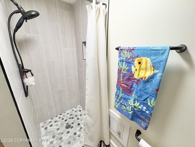 Rare availability in the Poconos. Step into your fully furnished on Split Rock Resort and Country Club in Pennsylvania - for sale on GolfHomes.com, golf home, golf lot