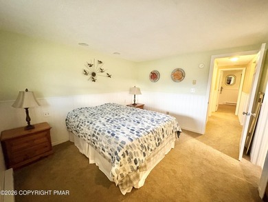 Rare availability in the Poconos. Step into your fully furnished on Split Rock Resort and Country Club in Pennsylvania - for sale on GolfHomes.com, golf home, golf lot