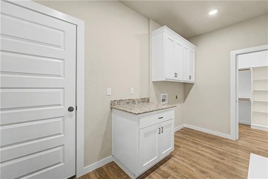 Experience modern living surrounded by nature! This brand-new on Bella Vista Country Club - Scottsdale in Arkansas - for sale on GolfHomes.com, golf home, golf lot