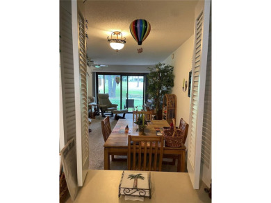 This 2 story Golf View Villa's condo is maintenance free and on Rainbow Springs Golf and Country Club in Florida - for sale on GolfHomes.com, golf home, golf lot