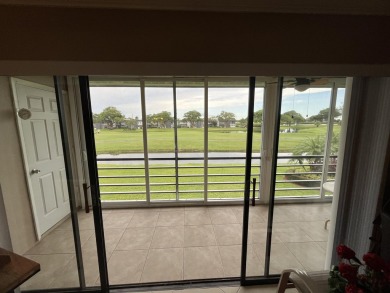 Afternoon setting sun from your huge wide enclosed patio on Kings Point Golf -Flanders Way in Florida - for sale on GolfHomes.com, golf home, golf lot