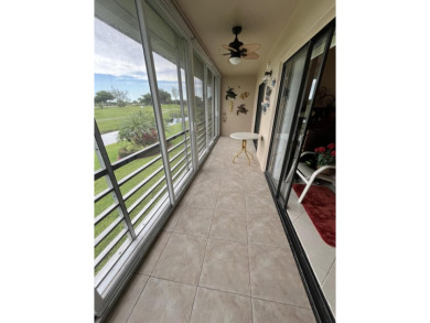 Afternoon setting sun from your huge wide enclosed patio on Kings Point Golf -Flanders Way in Florida - for sale on GolfHomes.com, golf home, golf lot