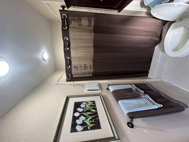 Afternoon setting sun from your huge wide enclosed patio on Kings Point Golf -Flanders Way in Florida - for sale on GolfHomes.com, golf home, golf lot