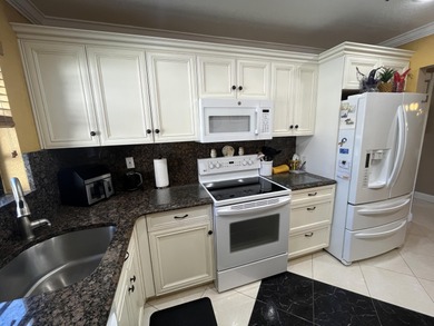 Afternoon setting sun from your huge wide enclosed patio on Kings Point Golf -Flanders Way in Florida - for sale on GolfHomes.com, golf home, golf lot