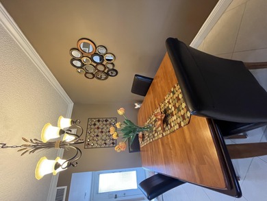 Afternoon setting sun from your huge wide enclosed patio on Kings Point Golf -Flanders Way in Florida - for sale on GolfHomes.com, golf home, golf lot