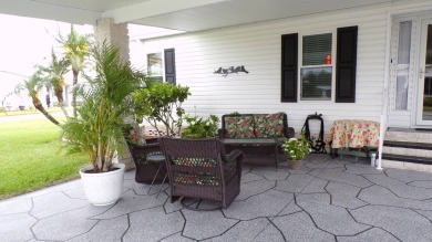When entering this gorgeous 2-bedroom, 2-bath Palm Harbor Home on Schalamar Creek Golf and Country Club in Florida - for sale on GolfHomes.com, golf home, golf lot