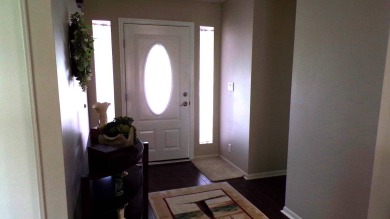 When entering this gorgeous 2-bedroom, 2-bath Palm Harbor Home on Schalamar Creek Golf and Country Club in Florida - for sale on GolfHomes.com, golf home, golf lot