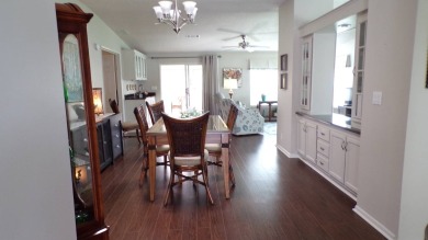When entering this gorgeous 2-bedroom, 2-bath Palm Harbor Home on Schalamar Creek Golf and Country Club in Florida - for sale on GolfHomes.com, golf home, golf lot