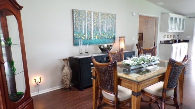 When entering this gorgeous 2-bedroom, 2-bath Palm Harbor Home on Schalamar Creek Golf and Country Club in Florida - for sale on GolfHomes.com, golf home, golf lot