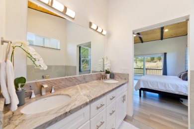 This stunning 3-bedroom, 2.5-bath home sits on the golf course on Discovery Harbour Golf Course in Hawaii - for sale on GolfHomes.com, golf home, golf lot