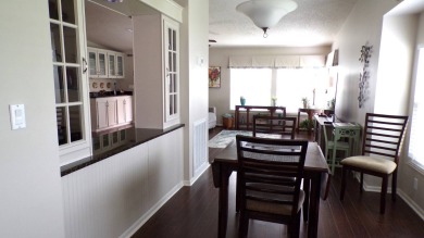 When entering this gorgeous 2-bedroom, 2-bath Palm Harbor Home on Schalamar Creek Golf and Country Club in Florida - for sale on GolfHomes.com, golf home, golf lot