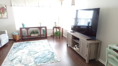 When entering this gorgeous 2-bedroom, 2-bath Palm Harbor Home on Schalamar Creek Golf and Country Club in Florida - for sale on GolfHomes.com, golf home, golf lot