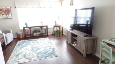 When entering this gorgeous 2-bedroom, 2-bath Palm Harbor Home on Schalamar Creek Golf and Country Club in Florida - for sale on GolfHomes.com, golf home, golf lot