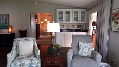 When entering this gorgeous 2-bedroom, 2-bath Palm Harbor Home on Schalamar Creek Golf and Country Club in Florida - for sale on GolfHomes.com, golf home, golf lot