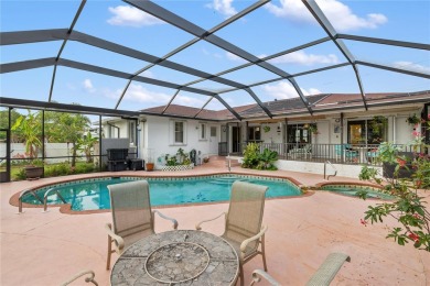 Escape to this Gulf access haven, with prime waterfront on Deep Creek Golf Club in Florida - for sale on GolfHomes.com, golf home, golf lot