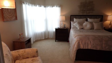 When entering this gorgeous 2-bedroom, 2-bath Palm Harbor Home on Schalamar Creek Golf and Country Club in Florida - for sale on GolfHomes.com, golf home, golf lot