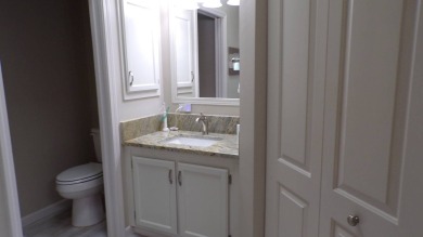When entering this gorgeous 2-bedroom, 2-bath Palm Harbor Home on Schalamar Creek Golf and Country Club in Florida - for sale on GolfHomes.com, golf home, golf lot