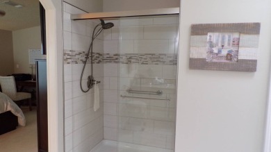 When entering this gorgeous 2-bedroom, 2-bath Palm Harbor Home on Schalamar Creek Golf and Country Club in Florida - for sale on GolfHomes.com, golf home, golf lot