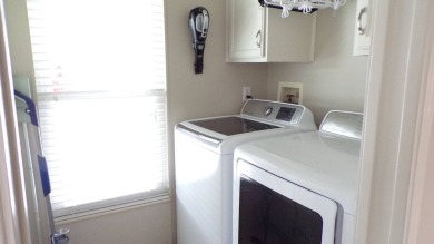 When entering this gorgeous 2-bedroom, 2-bath Palm Harbor Home on Schalamar Creek Golf and Country Club in Florida - for sale on GolfHomes.com, golf home, golf lot