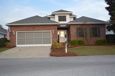 Beautiful home in quaint, white-picket-fenced, gated community on Fairway Oaks at Magnolia Golf Course in Florida - for sale on GolfHomes.com, golf home, golf lot