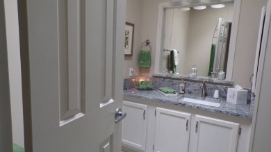 When entering this gorgeous 2-bedroom, 2-bath Palm Harbor Home on Schalamar Creek Golf and Country Club in Florida - for sale on GolfHomes.com, golf home, golf lot