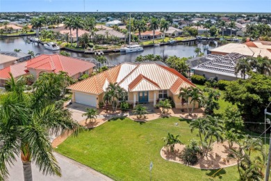 Under contract-accepting backup offers. PUNTA GORDA ISLES! on Saint Andrews South Golf Club in Florida - for sale on GolfHomes.com, golf home, golf lot