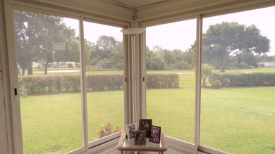 When entering this gorgeous 2-bedroom, 2-bath Palm Harbor Home on Schalamar Creek Golf and Country Club in Florida - for sale on GolfHomes.com, golf home, golf lot