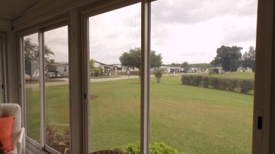 When entering this gorgeous 2-bedroom, 2-bath Palm Harbor Home on Schalamar Creek Golf and Country Club in Florida - for sale on GolfHomes.com, golf home, golf lot