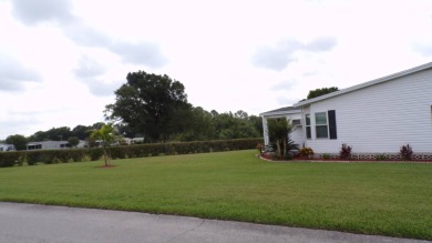 When entering this gorgeous 2-bedroom, 2-bath Palm Harbor Home on Schalamar Creek Golf and Country Club in Florida - for sale on GolfHomes.com, golf home, golf lot