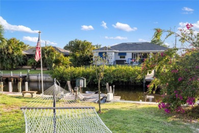 Escape to this Gulf access haven, with prime waterfront on Deep Creek Golf Club in Florida - for sale on GolfHomes.com, golf home, golf lot