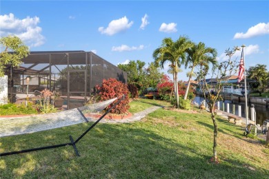 Escape to this Gulf access haven, with prime waterfront & on Deep Creek Golf Club in Florida - for sale on GolfHomes.com, golf home, golf lot