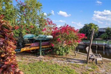 Escape to this Gulf access haven, with prime waterfront & on Deep Creek Golf Club in Florida - for sale on GolfHomes.com, golf home, golf lot