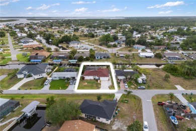 Escape to this Gulf access haven, with prime waterfront & on Deep Creek Golf Club in Florida - for sale on GolfHomes.com, golf home, golf lot