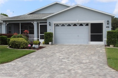 PRICE CHANGE! Nestled on a peaceful golf course, this beautiful on Arlington Ridge Golf Club in Florida - for sale on GolfHomes.com, golf home, golf lot