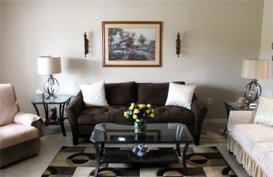 PRICE CHANGE! Nestled on a peaceful golf course, this beautiful on Arlington Ridge Golf Club in Florida - for sale on GolfHomes.com, golf home, golf lot