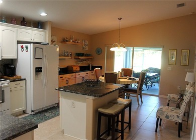 PRICE CHANGE! Nestled on a peaceful golf course, this beautiful on Arlington Ridge Golf Club in Florida - for sale on GolfHomes.com, golf home, golf lot
