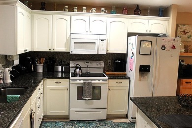 PRICE CHANGE! Nestled on a peaceful golf course, this beautiful on Arlington Ridge Golf Club in Florida - for sale on GolfHomes.com, golf home, golf lot