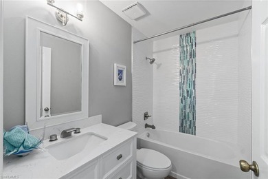 Sweeping, tranquil views set the tone for this beautifully on Estero Country Club in Florida - for sale on GolfHomes.com, golf home, golf lot