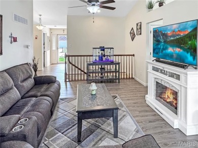 This luxury villa features an open floor plan boasting vaulted on Birch Creek Golf Club in Missouri - for sale on GolfHomes.com, golf home, golf lot
